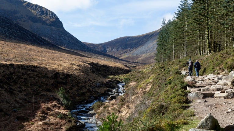 Visitors walk along a footpath up Slieve Donard, the Mournes, County Down